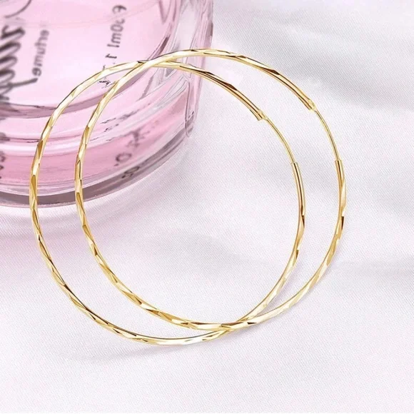 14K Yellow Gold Endless Twist Hoop Earrings, 50mm - Picture 3 of 6
